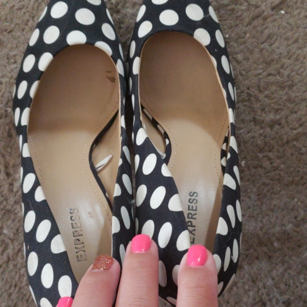 Express black and white polka dot pumps